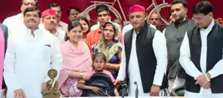 Akhilesh Yadav felicitates Ananya, the girl who saved her books during demolition drive
