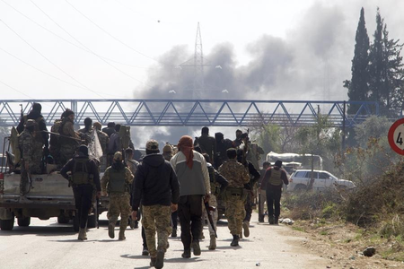 Clashes near Damascus continue as death toll rises to 18